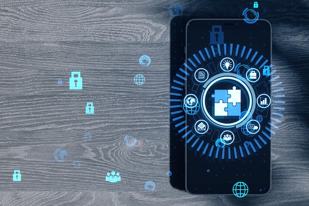 A close-up of a smartphone displaying various social media app icons overlaid with digital shield icons. A padlock icon hovers above the screen, symbolizing secure access and data protection.